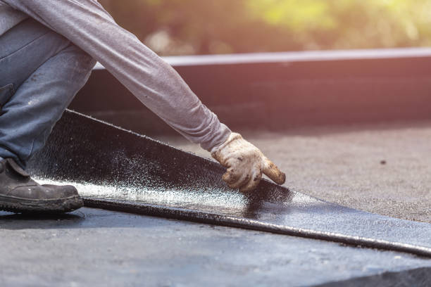 Professional Basement Waterproofing technician working in Quincy, MI